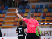 The referee officiates the Zamalek vs Veszprem match in the Men's Club Handball World Championship in Cairo. (