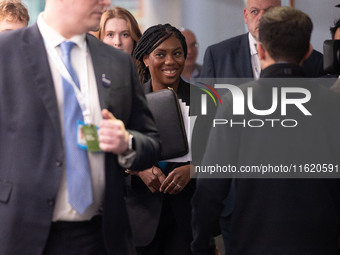 Kemi Badenoch MP, the second favorite to be the new Tory leader, walks through the ICC surrounded by her security detail at the Conservative...