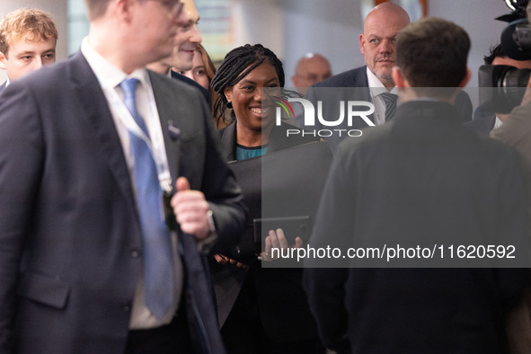 Kemi Badenoch MP, the second favorite to be the new Tory leader, walks through the ICC surrounded by her security detail at the Conservative...