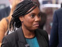 Kemi Badenoch MP, the second favorite to be the new Tory leader, walks through the ICC surrounded by her security detail at the Conservative...