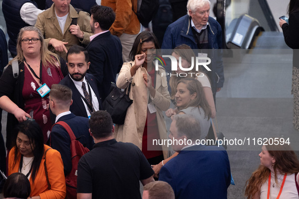 Delegates have fun at the Conservative Party Conference at the International Conference Centre in Birmingham, United Kingdom, on September 2...