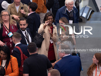 Delegates have fun at the Conservative Party Conference at the International Conference Centre in Birmingham, United Kingdom, on September 2...