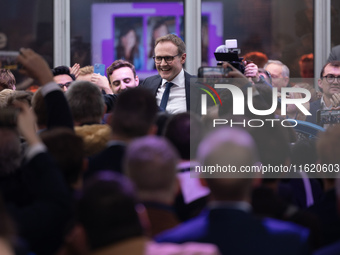 Tom Tugendhat MP gives a speech outside the InHouse marquee at the Conservative Party Conference at the International Conference Centre in B...