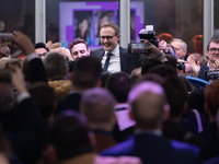 Tom Tugendhat MP gives a speech outside the InHouse marquee at the Conservative Party Conference at the International Conference Centre in B...