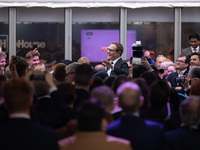 Tom Tugendhat MP gives a speech outside the InHouse marquee at the Conservative Party Conference at the International Conference Centre in B...