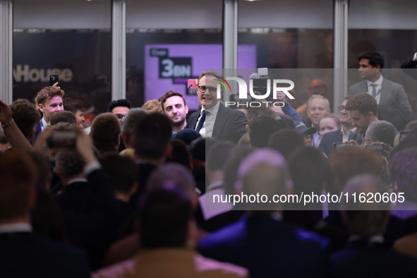 Tom Tugendhat MP gives a speech outside the InHouse marquee at the Conservative Party Conference at the International Conference Centre in B...