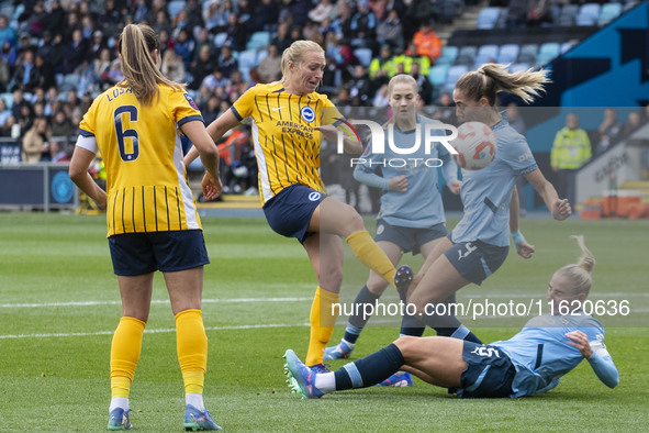 Laia Aleixandri #4 of Manchester City W.F.C. is fouled by the opponent during the Barclays FA Women's Super League match between Manchester...