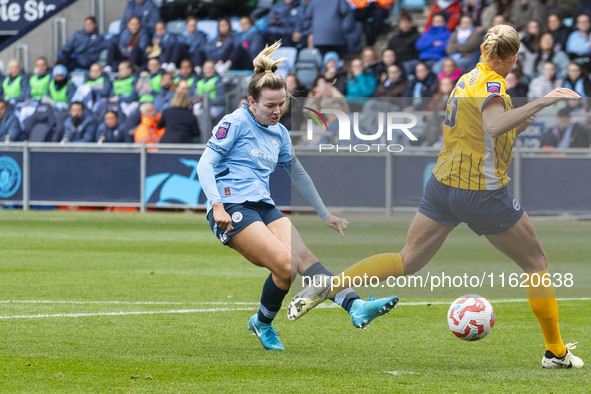 Lauren Hemp #11 of Manchester City W.F.C. takes a shot at goal during the Barclays FA Women's Super League match between Manchester City and...