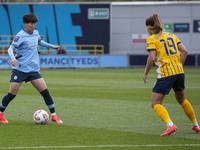 Aoba Fujino #20 of Manchester City W.F.C. possesses the ball during the Barclays FA Women's Super League match between Manchester City and B...