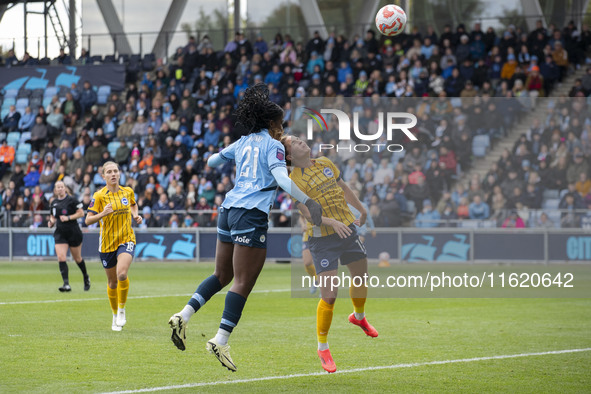 Khadija Shaw #21 of Manchester City W.F.C. heads the ball during the Barclays FA Women's Super League match between Manchester City and Brig...