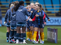 Manchester City W.F.C. and Brighton & Hove Albion W.F.C. shake hands before the match during the Barclays FA Women's Super League match betw...