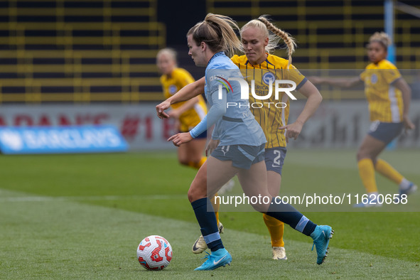 Lauren Hemp #11 of Manchester City W.F.C. is in action during the Barclays FA Women's Super League match between Manchester City and Brighto...