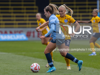 Lauren Hemp #11 of Manchester City W.F.C. is in action during the Barclays FA Women's Super League match between Manchester City and Brighto...