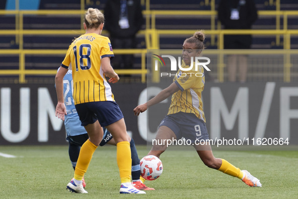 Nikita Parris #9 of Brighton & Hove Albion W.F.C. is in action during the Barclays FA Women's Super League match between Manchester City and...