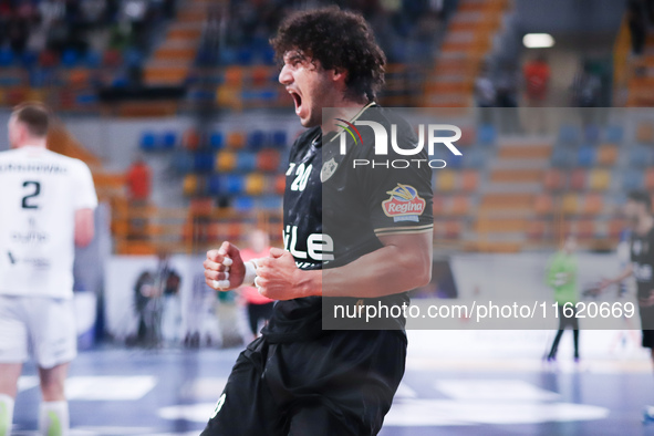 Zamalek's Youssef celebrates his goal during his team's match against Hungary's Veszprem in the Men's Handball Club World Championship in Ca...