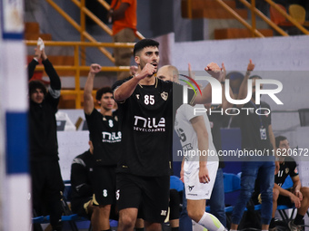 A Zamalek player celebrates during his team's match against the Hungarian team Veszprem in the Men's Handball Club World Championship in Cai...