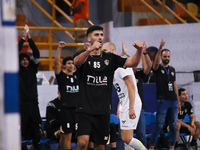 A Zamalek player celebrates during his team's match against the Hungarian team Veszprem in the Men's Handball Club World Championship in Cai...