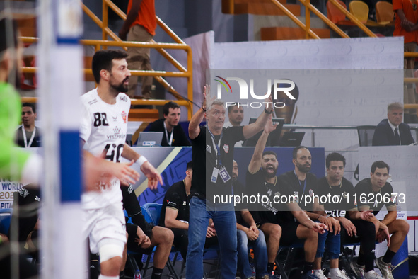 The Zamalek coach gets emotional during his team's match against the Hungarian team Veszprem in the Men's Handball Club World Championship i...