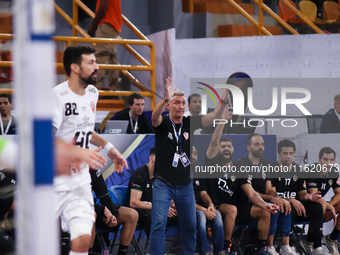 The Zamalek coach gets emotional during his team's match against the Hungarian team Veszprem in the Men's Handball Club World Championship i...