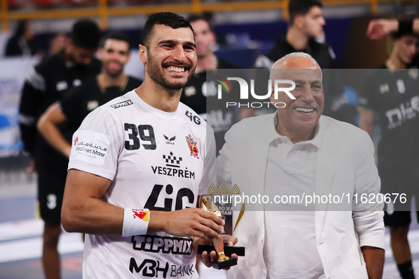 Yehia El-Deraa, Veszprem player, receives the Man of the Match award in the Zamalek vs Veszprem match in the Men's Handball Club World Champ...