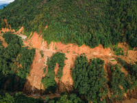 A drone view shows roadblocks on Charghare caused by landslides due to heavy rainfall in southern Lalitpur, Nepal, on September 29, 2024. (