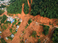 A drone view shows roadblocks on Charghare caused by landslides due to heavy rainfall in southern Lalitpur, Nepal, on September 29, 2024. (