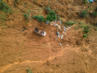 A drone view shows roadblocks on Charghare caused by landslides due to heavy rainfall in southern Lalitpur, Nepal, on September 29, 2024. (