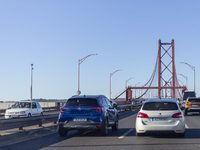 Cars drive near the 25 de Abril bridge in Lisbon, Portugal, on September 29, 2024. Data from the Portuguese Association of Highway Concessio...