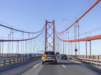 Cars drive on the 25 de Abril bridge in Lisbon, Portugal, on September 29, 2024. Data from the Portuguese Association of Highway Concessiona...