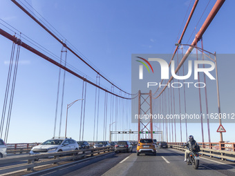 Cars drive on the 25 de Abril bridge in Lisbon, Portugal, on September 29, 2024. Data from the Portuguese Association of Highway Concessiona...