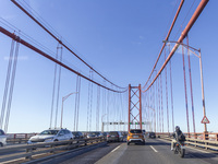 Cars drive on the 25 de Abril bridge in Lisbon, Portugal, on September 29, 2024. Data from the Portuguese Association of Highway Concessiona...