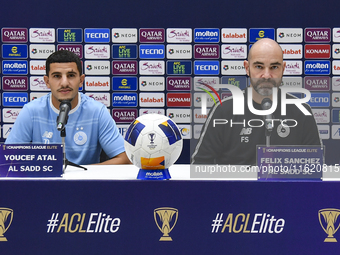 Felix Sanchez Bas (R), Head Coach of Al Sadd FC, and player Youcef Atal (L) attend the press conference ahead of the AFC Champions League el...