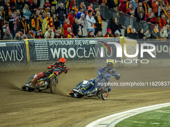 Jakub Krawczyk and Bartosz Banbor participate in a PGE Speedway Ekstraliga game between Sparta Wroclaw and Motor Lublin in Wroclaw, Poland,...