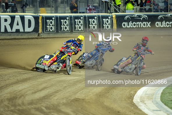 Artem Laguta, Bartlomiej Kowalski, and Fredrik Lindgren participate in a PGE Speedway Ekstraliga game between Sparta Wroclaw and Motor Lubli...