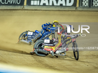 Daniel Bewley and Bartosz Zmarzlik participate in a PGE Speedway Ekstraliga game between Sparta Wroclaw and Motor Lublin in Wroclaw, Poland,...