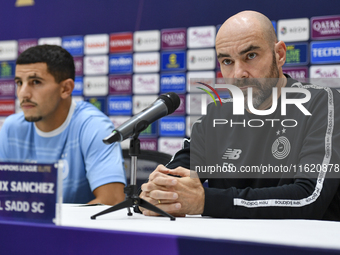 Felix Sanchez Bas (R), Head Coach of Al Sadd FC, attends the press conference ahead of the AFC Champions League elite west football match be...