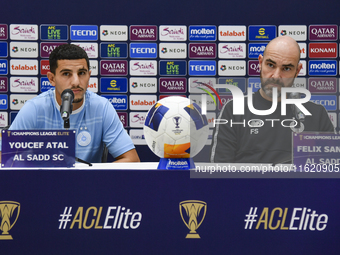 Felix Sanchez Bas (R), Head Coach of Al Sadd FC, and player Youcef Atal (L) attend the press conference ahead of the AFC Champions League el...