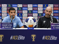 Felix Sanchez Bas (R), Head Coach of Al Sadd FC, and player Youcef Atal (L) attend the press conference ahead of the AFC Champions League el...