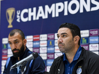 Roozbeh Cheshmi, Head Coach of Esteghlal FC, and player Javad Nekounam attend the press conference ahead of the AFC Champions League elite w...