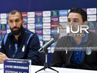 Roozbeh Cheshmi, Head Coach of Esteghlal FC, and player Javad Nekounam attend the press conference ahead of the AFC Champions League elite w...