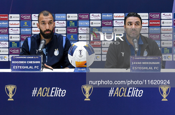 Roozbeh Cheshmi, Head Coach of Esteghlal FC, and player Javad Nekounam attend the press conference ahead of the AFC Champions League elite w...