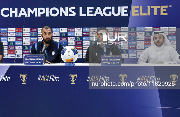 Roozbeh Cheshmi, Head Coach of Esteghlal FC, and player Javad Nekounam attend the press conference ahead of the AFC Champions League elite w...