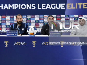 Roozbeh Cheshmi, Head Coach of Esteghlal FC, and player Javad Nekounam attend the press conference ahead of the AFC Champions League elite w...