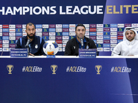 Roozbeh Cheshmi, Head Coach of Esteghlal FC, and player Javad Nekounam attend the press conference ahead of the AFC Champions League elite w...