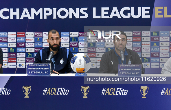 Roozbeh Cheshmi, Head Coach of Esteghlal FC, and player Javad Nekounam attend the press conference ahead of the AFC Champions League elite w...