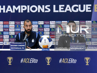 Roozbeh Cheshmi, Head Coach of Esteghlal FC, and player Javad Nekounam attend the press conference ahead of the AFC Champions League elite w...