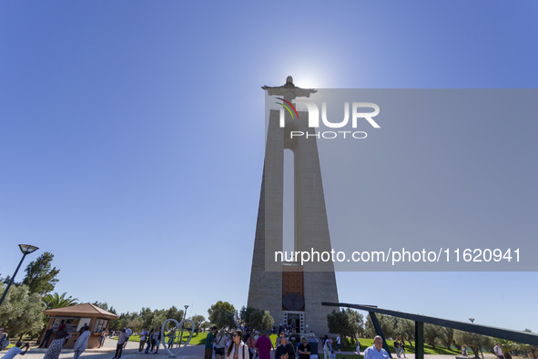 A general view of people at the Cristo Rei monument in Lisbon, Portugal, on September 29, 2024. Cristo Rei attracts pilgrims, tourists, and...