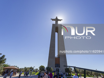 A general view of people at the Cristo Rei monument in Lisbon, Portugal, on September 29, 2024. Cristo Rei attracts pilgrims, tourists, and...