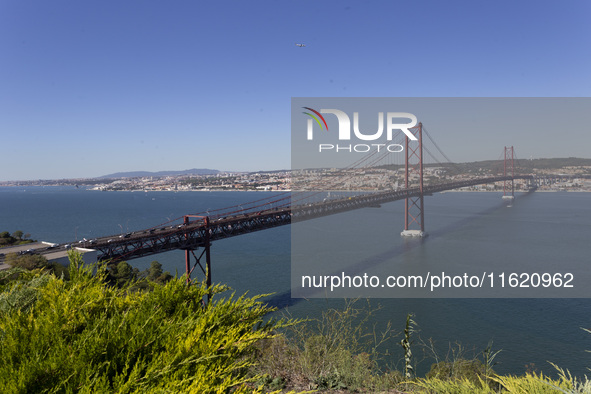 A general view of the 25 de Abril Bridge in Lisbon, Portugal, on September 29, 2024. Cristo Rei attracts pilgrims, tourists, and visitors fr...