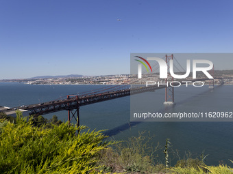 A general view of the 25 de Abril Bridge in Lisbon, Portugal, on September 29, 2024. Cristo Rei attracts pilgrims, tourists, and visitors fr...